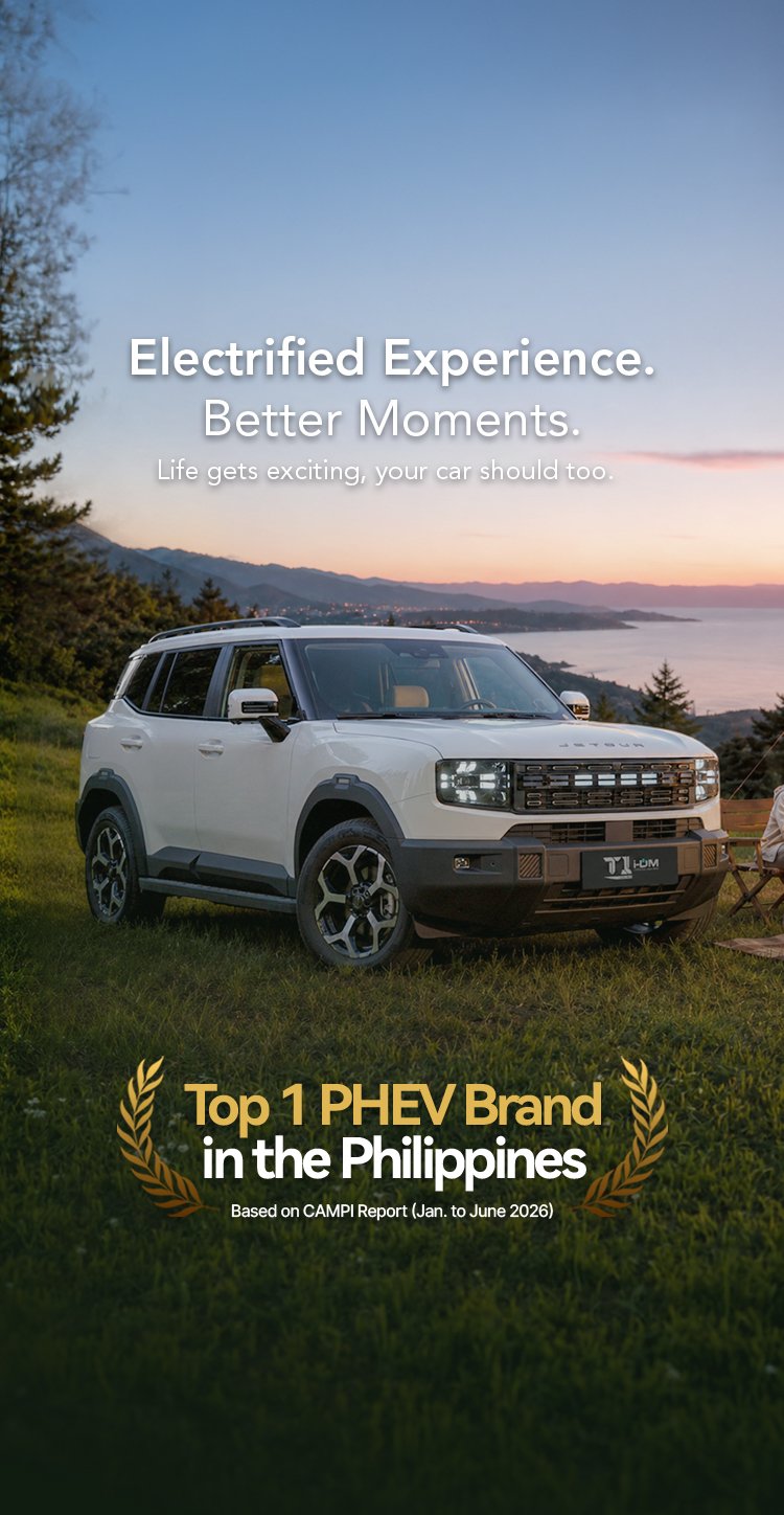 Jetour T1 i-DM plug-in hybrid SUV beside a family campsite overlooking the coast at sunset.
